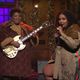 Lizzo, right, and guitarist Celisse, both wearing Dapper Dan for Gucci, perform ‘Truth Hurts’ on SNL.
